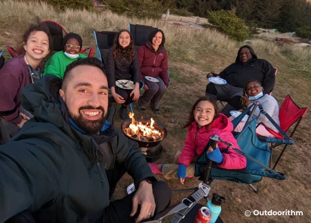 Black American father and twin brother tending gardens