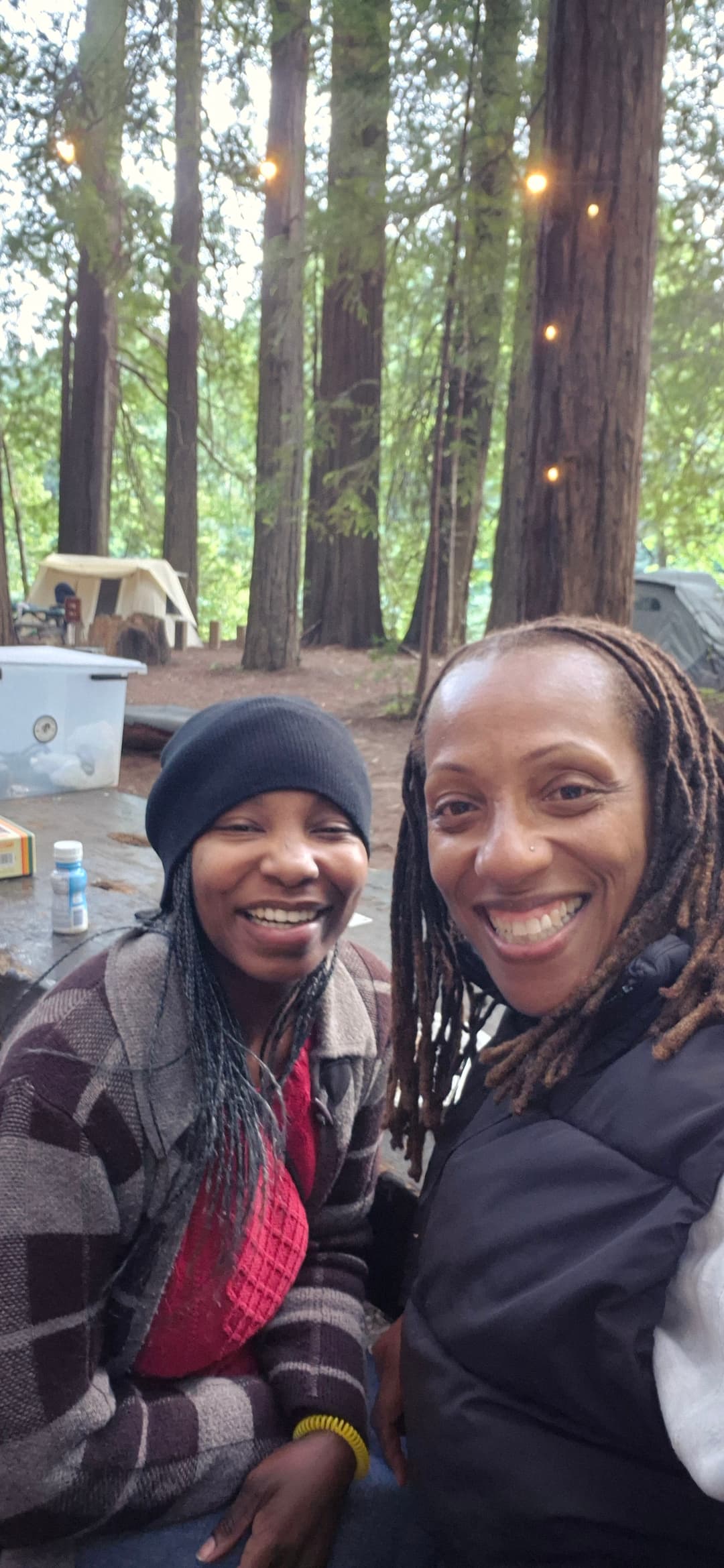Bailey (left) with board member Michelle Austin at a camping trip